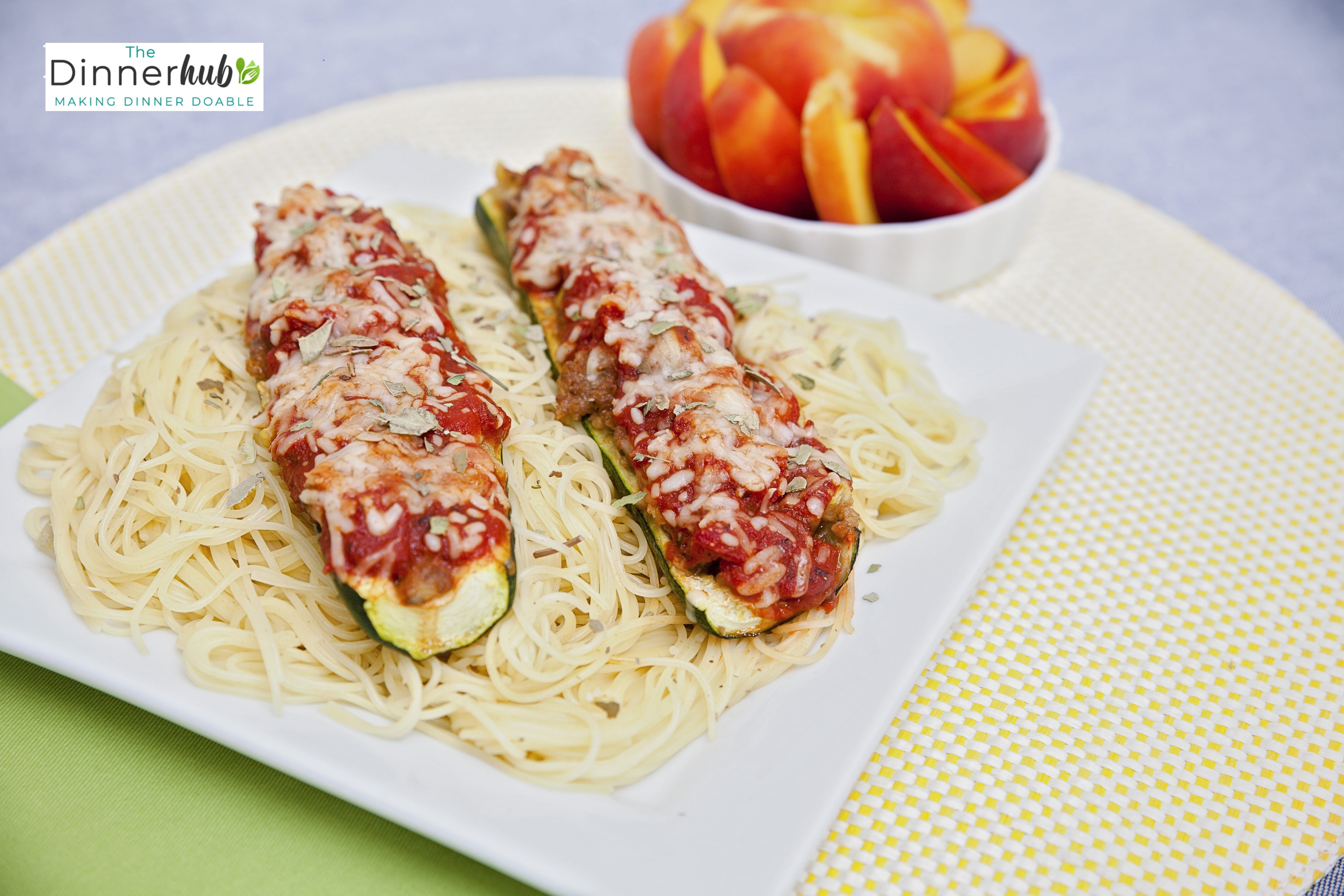 Zucchini Sausage Boats over Pasta w/ Peach Cups